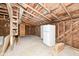Spacious garage with open rafter ceiling, shelving, and plenty of room for storage at 1254 E 400 N, Greenfield, IN 46140