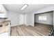 Kitchen with gray walls, grey floors, and white cabinets offering a neutral modern space at 1254 E 400 N, Greenfield, IN 46140