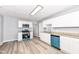 Bright kitchen features granite counters, stainless appliances, and ample storage space at 1254 E 400 N, Greenfield, IN 46140