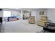 Finished basement with seating, gym, and carpeted floor at 12753 Bristow Ln, Fishers, IN 46037