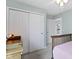 Bedroom featuring a wood bed frame, light blue walls and a closet at 12753 Bristow Ln, Fishers, IN 46037