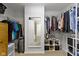 Walk-in closet with shelving, a mirror and an open door to the bathroom at 12753 Bristow Ln, Fishers, IN 46037
