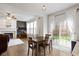Bright dining area with slider to the patio and backyard at 12753 Bristow Ln, Fishers, IN 46037