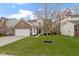 Charming home featuring a well-kept lawn and garden with a welcoming front entrance at 12753 Bristow Ln, Fishers, IN 46037