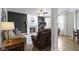 Living room with fireplace and large windows at 12753 Bristow Ln, Fishers, IN 46037