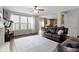 Open living room with fireplace and lots of light and access to kitchen at 12753 Bristow Ln, Fishers, IN 46037