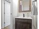 Stylish powder room with patterned vanity and beadboard walls at 12753 Bristow Ln, Fishers, IN 46037