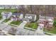 A street view highlights single-Gathering homes, showcasing their front yards and architectural styles at 12753 Bristow Ln, Fishers, IN 46037