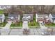 A street view highlights single-Gathering homes, showcasing their front yards and architectural styles at 12753 Bristow Ln, Fishers, IN 46037