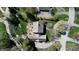 An aerial view of the backyard showing the home, deck and patios at 13599 Brentwood Ln, Carmel, IN 46033