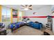 Bright bedroom with two twin beds, large windows, and colorful decor at 13820 N Cardonia Dr, Camby, IN 46113