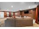 Open-concept living area featuring contemporary decor, comfortable seating, and recessed lighting at 13820 N Cardonia Dr, Camby, IN 46113