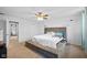 Neutral main bedroom featuring neutral carpet, and a tufted headboard at 13820 N Cardonia Dr, Camby, IN 46113