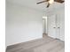 Bedroom features wood-look flooring and a closet with double doors at 13847 Wabash Dr, Fishers, IN 46038
