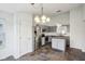 Open kitchen with stainless steel appliances, stone floors, and plenty of cabinet space at 13847 Wabash Dr, Fishers, IN 46038