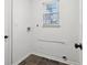 Functional laundry room with window, basic hookups, and neutral walls at 13847 Wabash Dr, Fishers, IN 46038