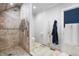 Bright bathroom with walk-in shower and neutral tiling at 1403 Fletcher Ave, Indianapolis, IN 46203