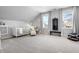 Bright Bedroom with a crib and natural light at 1403 Fletcher Ave, Indianapolis, IN 46203