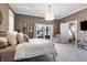 Bedroom with large windows, pendant lighting and a cozy seating area at 1403 Fletcher Ave, Indianapolis, IN 46203