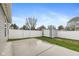 Well-maintained backyard featuring a shed and concrete patio area, perfect for outdoor enjoyment at 1468 Lexington Trl, Greenfield, IN 46140