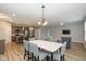 Open dining area flows seamlessly into the kitchen and living room, promoting a spacious and connected feel at 1468 Lexington Trl, Greenfield, IN 46140