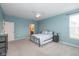 Comfortable bedroom features a large window and a closet door to the left at 1468 Lexington Trl, Greenfield, IN 46140