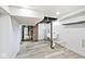 Unfinished basement area with exposed brick, utility connections, and potential for customization at 1511 E Tabor St, Indianapolis, IN 46203