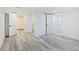 A light and airy basement featuring white walls, light gray floors, recessed lights, and white paneled doors at 1511 E Tabor St, Indianapolis, IN 46203
