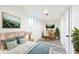 This finished bedroom offers a versatile space with new flooring, fresh paint and natural light at 1511 E Tabor St, Indianapolis, IN 46203