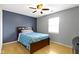 A comfortably sized bedroom offering natural light and a ceiling fan at 1517 Citation N Cir, Lebanon, IN 46052