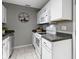The kitchen offers a white range, cabinetry, and decorative accents at 1517 Citation N Cir, Lebanon, IN 46052