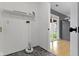 Bright laundry area with marble floors, shelves and access to the backyard at 1517 Citation N Cir, Lebanon, IN 46052