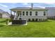 The backyard features a lush lawn and outdoor seating at 16422 Brigham Ln, Westfield, IN 46074