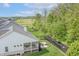 This aerial view highlights the covered patio and landscaping at 16422 Brigham Ln, Westfield, IN 46074