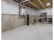 Unfinished basement featuring exposed piping and a water filtration system at 16422 Brigham Ln, Westfield, IN 46074