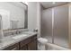 Modern bathroom with granite countertop, glass shower, and tile accents at 16422 Brigham Ln, Westfield, IN 46074