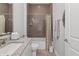 Bathroom with granite countertops, tub shower, and decorative tile at 16422 Brigham Ln, Westfield, IN 46074