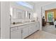 Bathroom featuring double vanity with granite countertops and views to the bedroom at 16422 Brigham Ln, Westfield, IN 46074