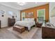 Inviting main bedroom features an accent wall, hardwood floors, and natural light at 16422 Brigham Ln, Westfield, IN 46074