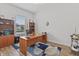 Office with large desk, a window, and built in book shelves at 16422 Brigham Ln, Westfield, IN 46074