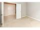 Bedroom featuring neutral carpet and light gray walls, with a view into an adjacent room at 18009 Sun Ridge Cir, Noblesville, IN 46062