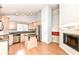 Kitchen with granite countertops, central island and stainless steel appliances at 18009 Sun Ridge Cir, Noblesville, IN 46062