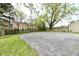 Expansive backyard space with a large paved area, ideal for entertaining at 1934 N Arlington Ave, Indianapolis, IN 46218