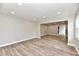 Bright and airy living room with recessed lighting and ample space, leading into an open floor plan at 1934 N Arlington Ave, Indianapolis, IN 46218