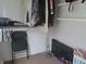 Organized walk-in closet with shelving and a rack, maximizing storage space at 2012 N Janney Ave, Muncie, IN 47304