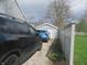 Detached garage and parking area, providing ample space for vehicles and outdoor storage at 2012 N Janney Ave, Muncie, IN 47304