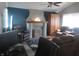 Cozy living room with a fireplace and comfortable seating arrangement at 2012 N Janney Ave, Muncie, IN 47304