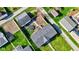 Aerial view of home featuring a detached garage, trampoline and easy access to neighborhood streets at 220 E Meridian St, Atlanta, IN 46031