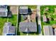 Aerial view of the home showcases the yard, deck, trampoline and detached garage at 220 E Meridian St, Atlanta, IN 46031