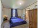 Bedroom with bed and bath access at 220 E Meridian St, Atlanta, IN 46031